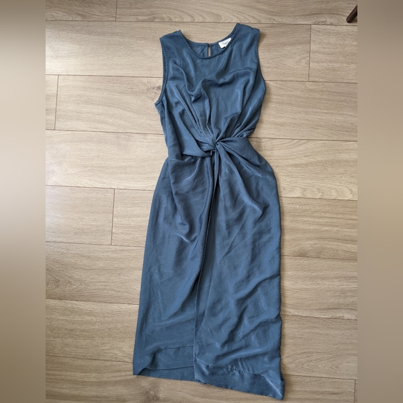 Asymmetrical, teal dress with waist cinching. - Picture 1 of 7